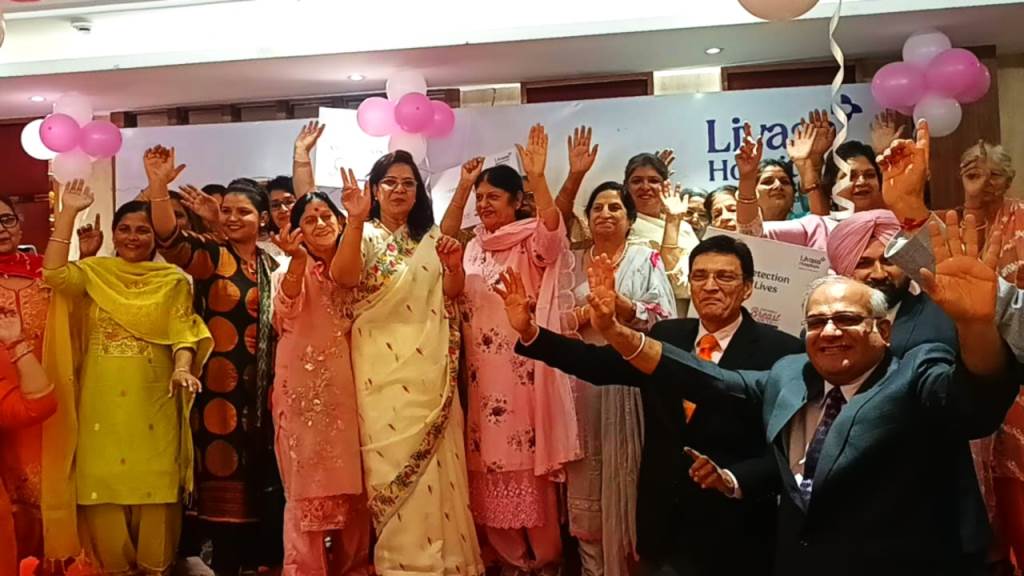 Cancer survivor walks ramp with doctors